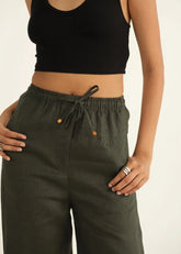 A Model Wearing Green Linen Dark Green Linen Drawstring Straight Pants , curated by Only Ethikal